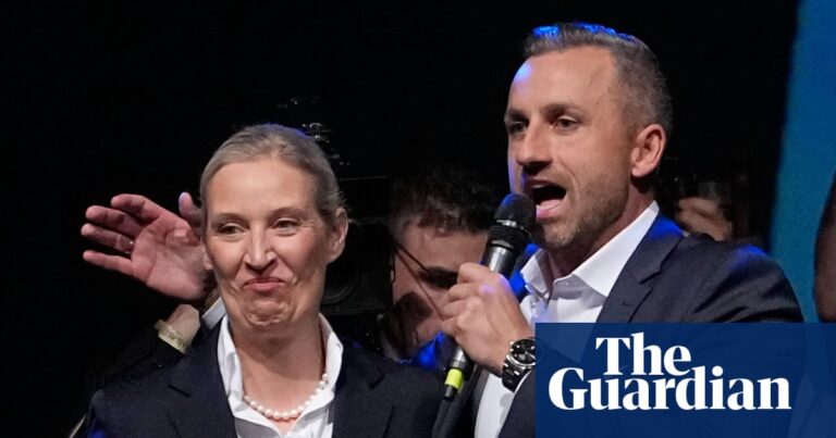 Lead Saxony Anhalt candidate Ulrich Siegmund, right, speaks beside party co-founder Alice Weidel at an election party on Sunday after the AfD was projected to win the state election.