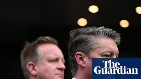Victorian Premier Ben Carroll speaks at a press conference beside Police Minister Paul Edbrooke